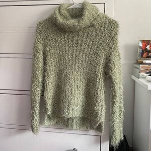 fluffy green turtleneck